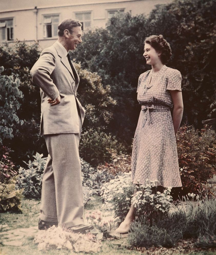 PHOTO: Princess Elizabeth, the future Queen Elizabeth II, talking with her father, King George VI, July 8, 1946. 