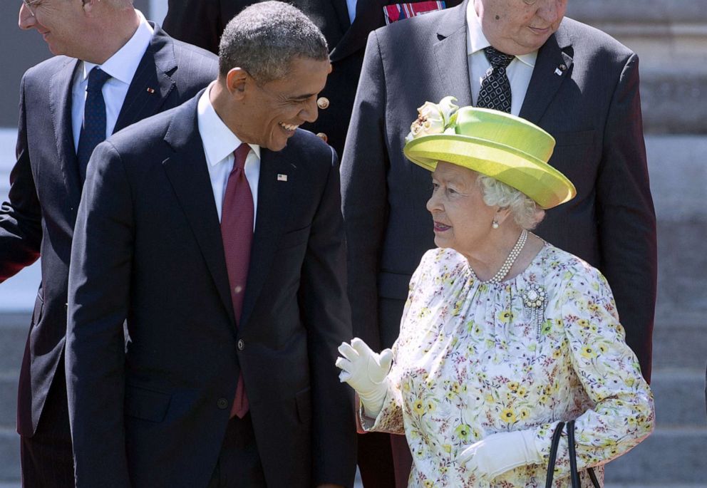 PHOTO: In this file photo taken on June 6, 2014, Queen Elizabeth II speaks with President Barack Obama during a group photo of world leaders attending the D-Day 70th Anniversary ceremonies at Chateau de Benouville in Benouville, France.