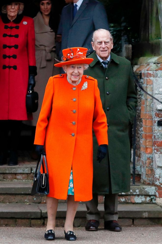 PHOTO: Queen Elizabeth II and Prince Philip, Duke of Edinburgh leave after Christmas Day church service at St Mary Magdalene Church in Sandringham, Norfolk, eastern England, Dec. 25, 2017. 