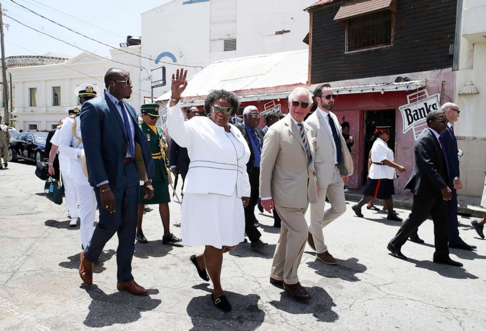 PHOTO: Prime Minister of Barbados Mia Mottley accompanies  Charles, the Prince of Wales during a royal tour of Bridgetown, Barbados, March 18, 2019.