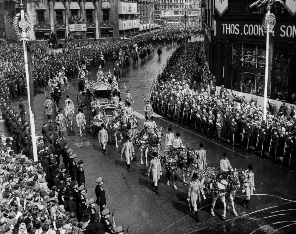 PHOTO: Crowds line Pall Mall as Queen Elizabeth II and her pageant pass on the way to her coronation ceremony, June 02, 1953.