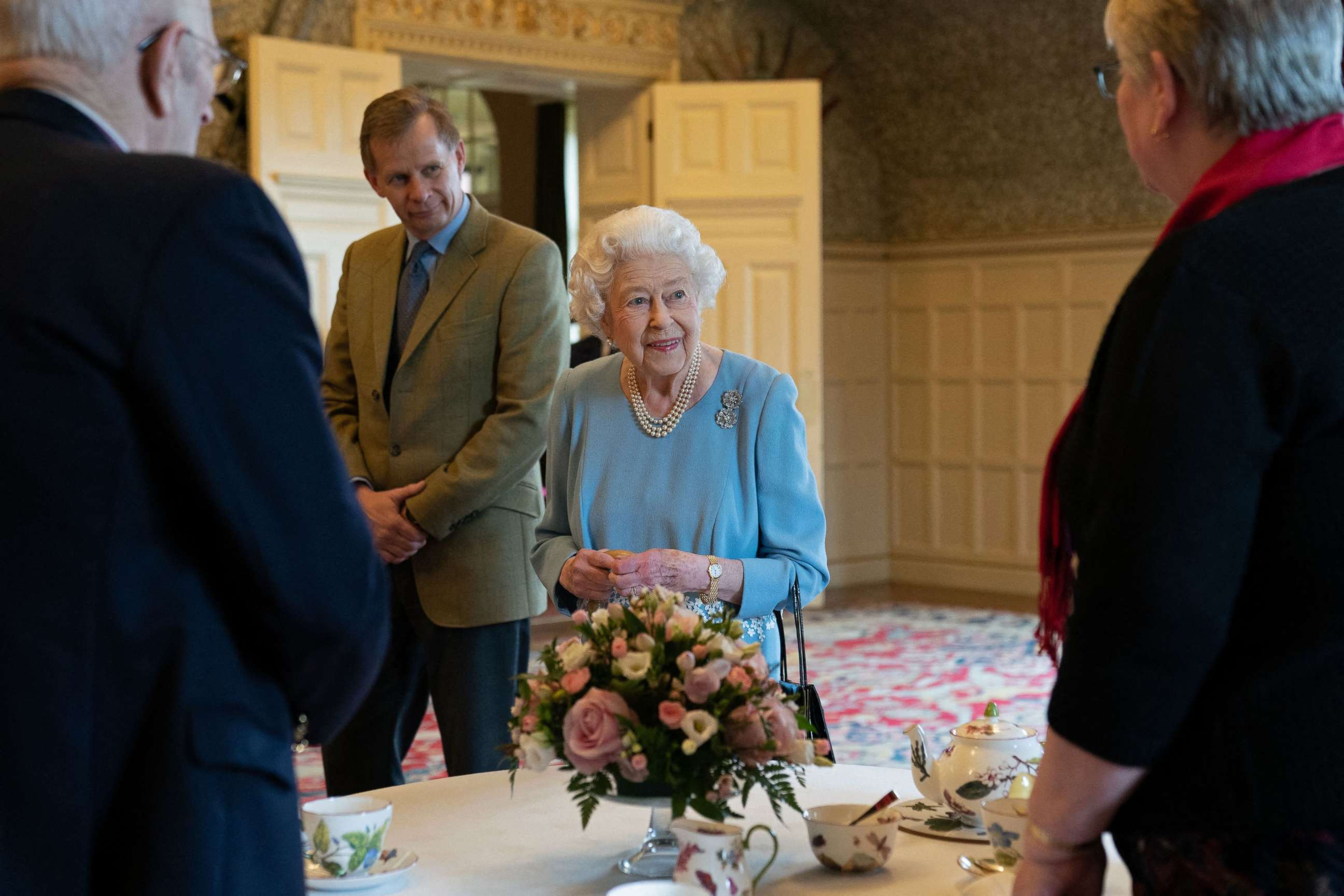PHOTO: Britain's Queen Elizabeth II talks to pensioners from the Sandringham Estate during a reception in the Ballroom of Sandringham House, the Queen's Norfolk residence on Feb. 5, 2022, as she celebrates the start of the Platinum Jubilee. 