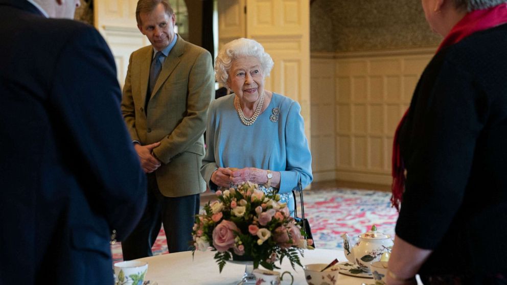 PHOTO: Britain's Queen Elizabeth II talks to pensioners from the Sandringham Estate during a reception in the Ballroom of Sandringham House, the Queen's Norfolk residence on Feb. 5, 2022, as she celebrates the start of the Platinum Jubilee. 
