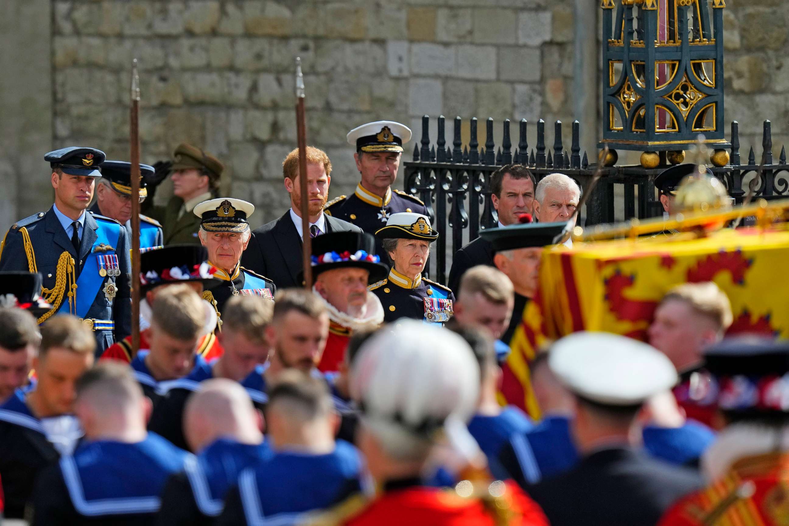 PHOTO: King Charles III, Princess Anne, Prince William, rear left, and Prince Harry, center rear, follow the coffin of Queen Elizabeth II as it is carried out of Westminster Abbey for her funeral in London, Sept. 19, 2022.