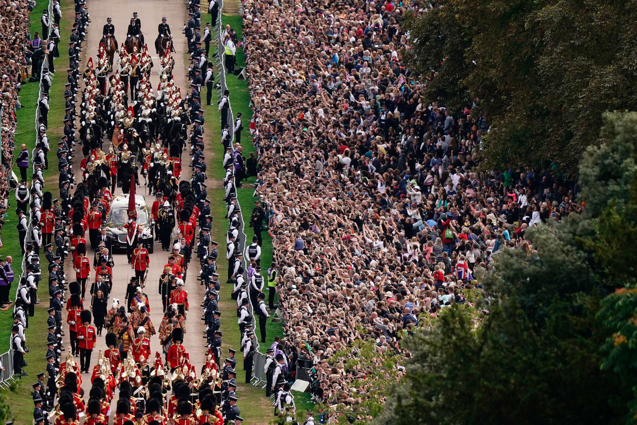 PHOTO: The Ceremonial Procession of the coffin of Queen Elizabeth II travels down the Long Walk as it arrives at Windsor Castle for the Committal Service at St George's Chapel, in Windsor, England, Sept. 19, 2022.