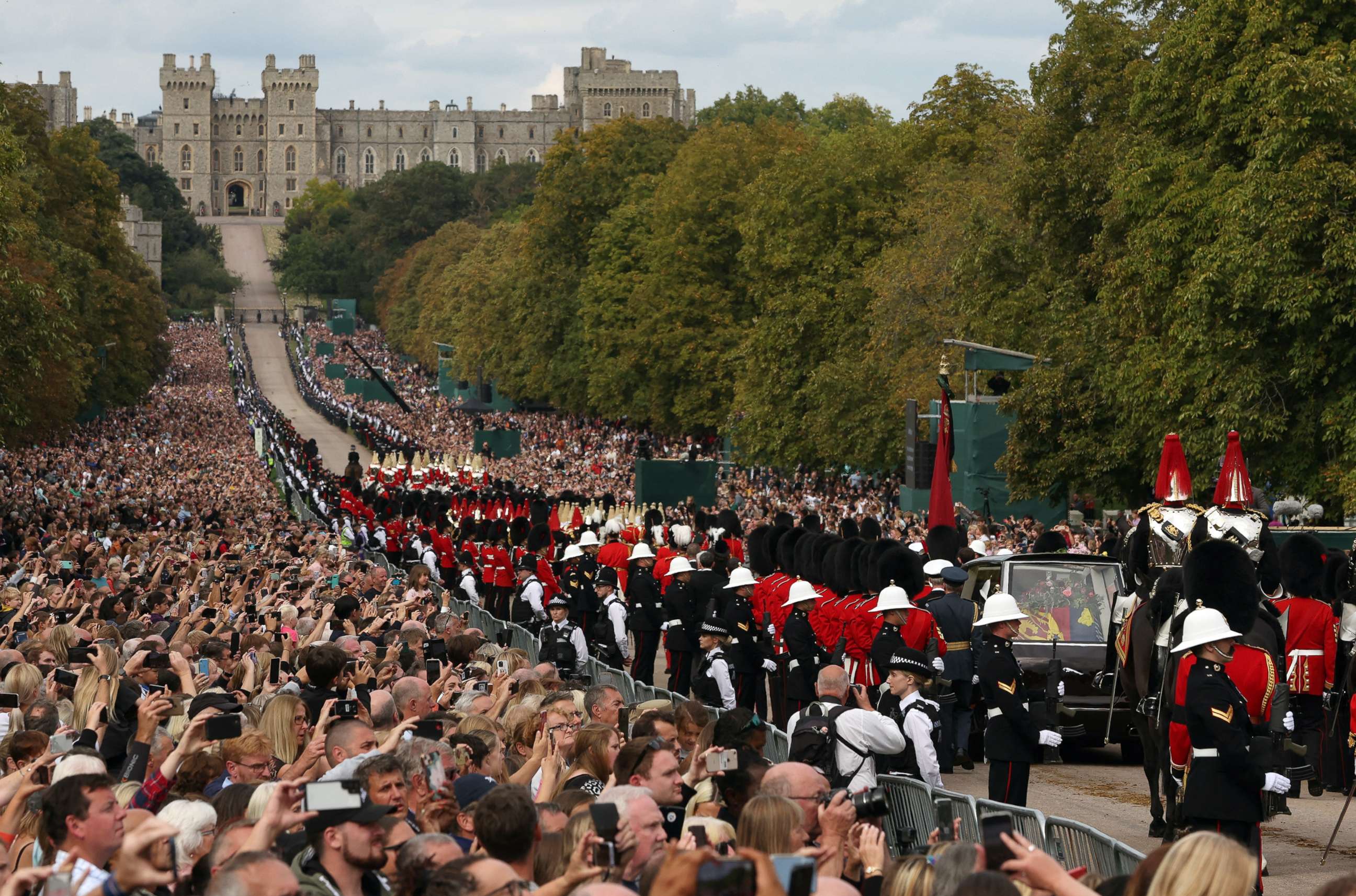PHOTO: The hearse carrying the coffin of Britain's Queen Elizabeth is escorted along the Long Walk towards Windsor castle in the funeral procession, on the day of the state funeral and burial, in Windsor, Britain, Sept. 19, 2022. 