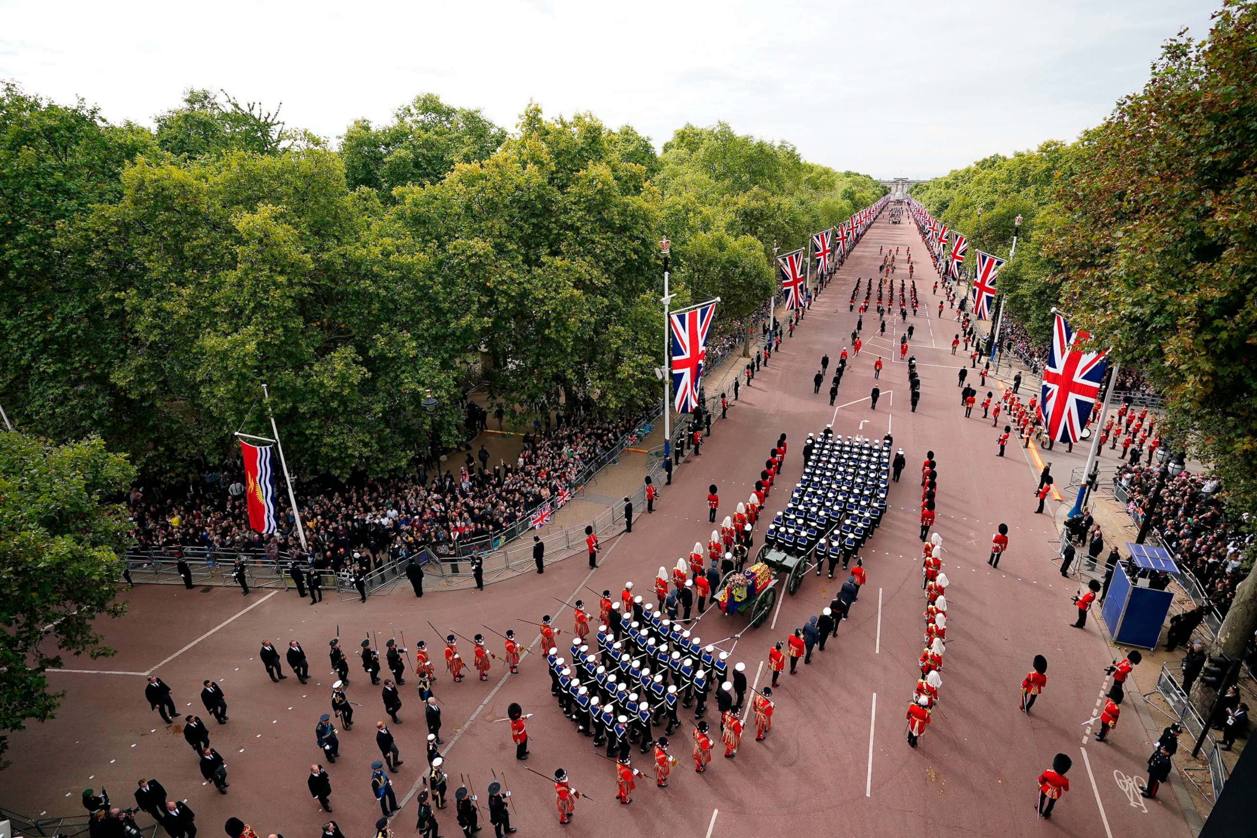 PHOTO: The funeral procession marches down The Mall following the service at Westminster Abbey, on the day of the state funeral and burial of Britain's Queen Elizabeth II, in London, Sept. 19, 2022.