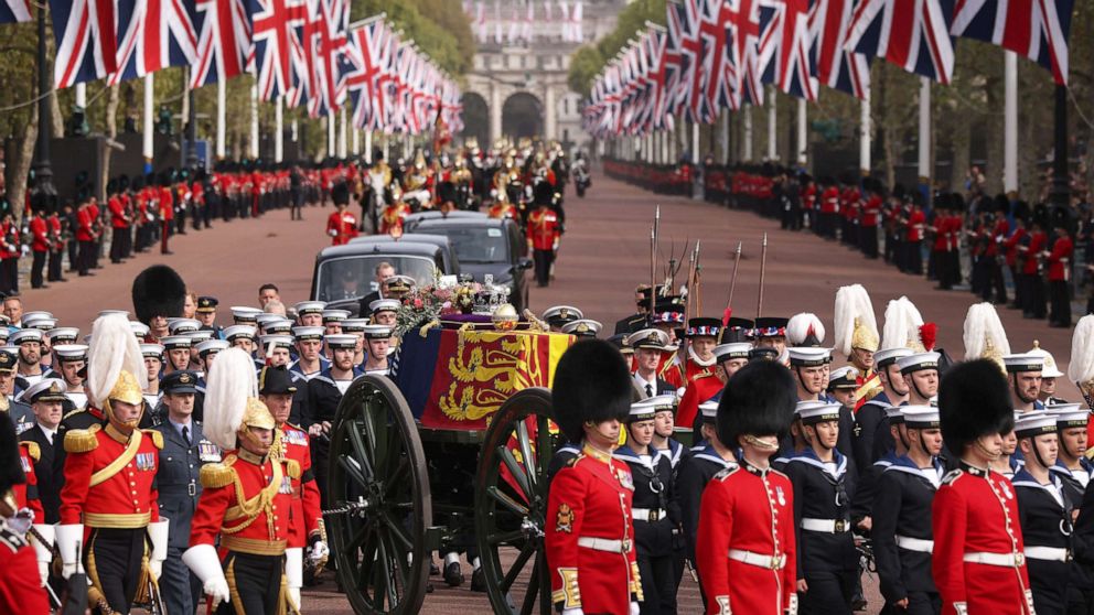 PHOTO: The Queen's funeral cortege borne on the State Gun Carriage of the Royal Navy travels along The Mall on Sept. 19, 2022 in London.