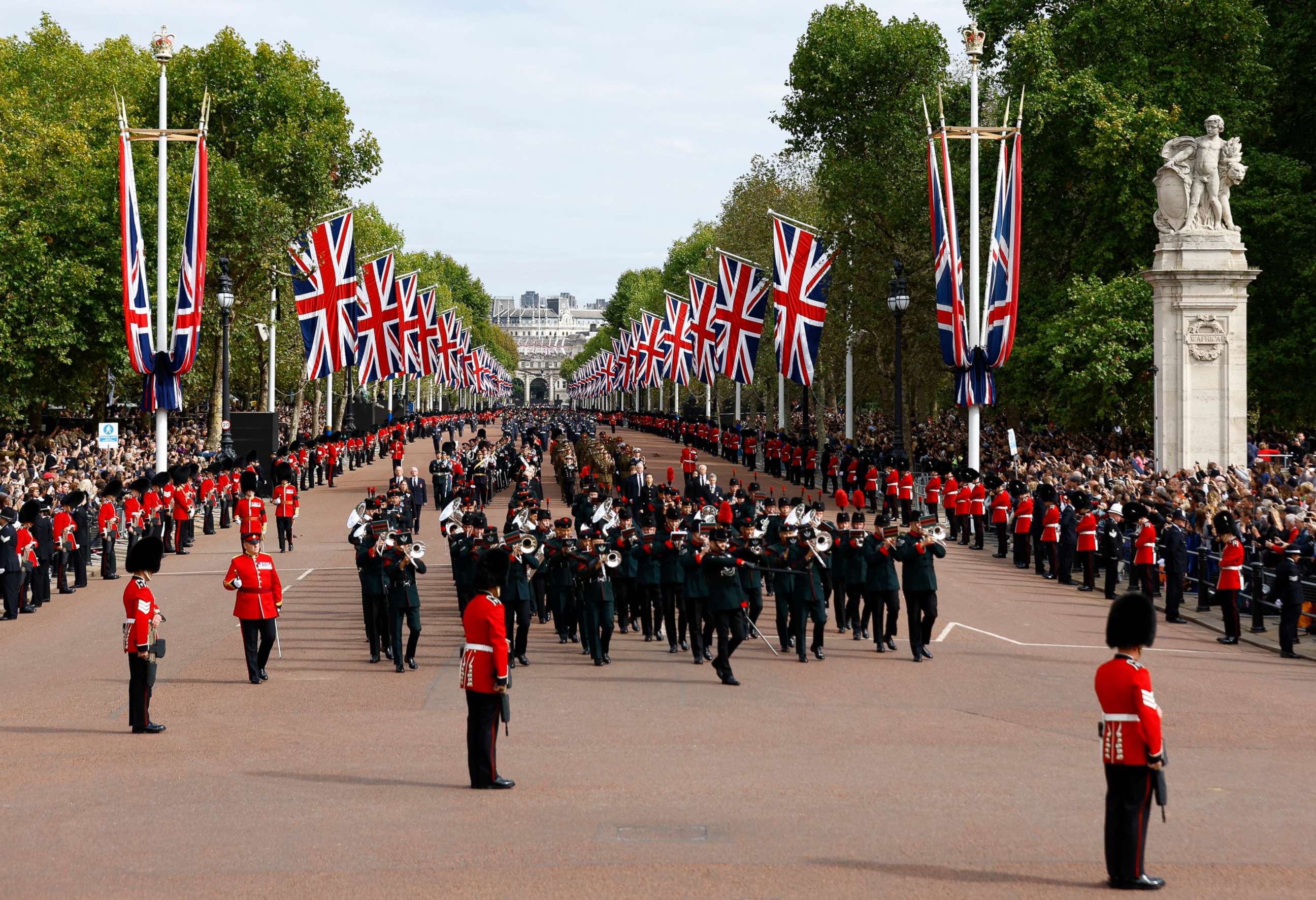 PHOTO: The funeral procession marches down The Mall following the service at Westminster Abbey, on the day of the state funeral and burial of Britain's Queen Elizabeth, in London, Sept. 19, 2022.