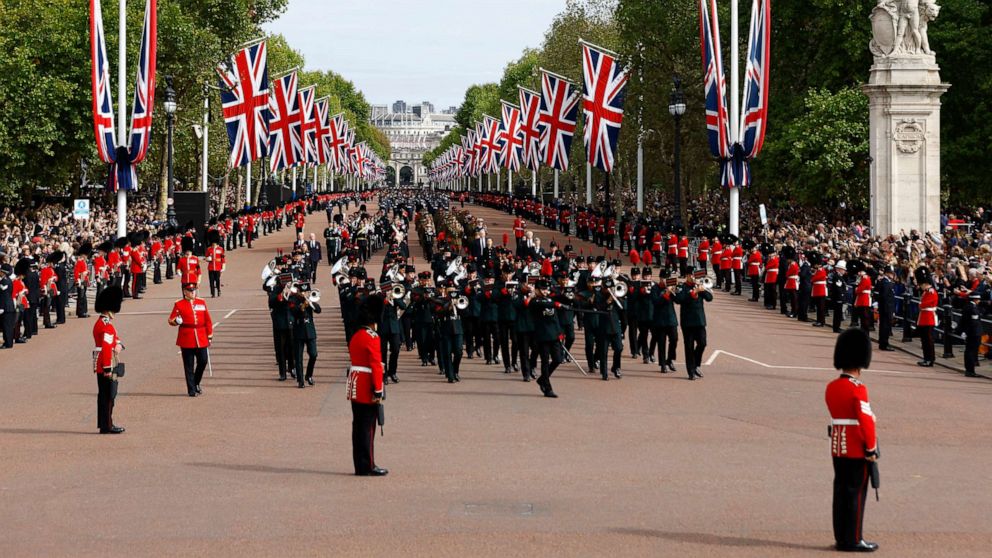 PHOTO: The funeral procession marches down The Mall following the service at Westminster Abbey, on the day of the state funeral and burial of Britain's Queen Elizabeth, in London, Sept. 19, 2022.