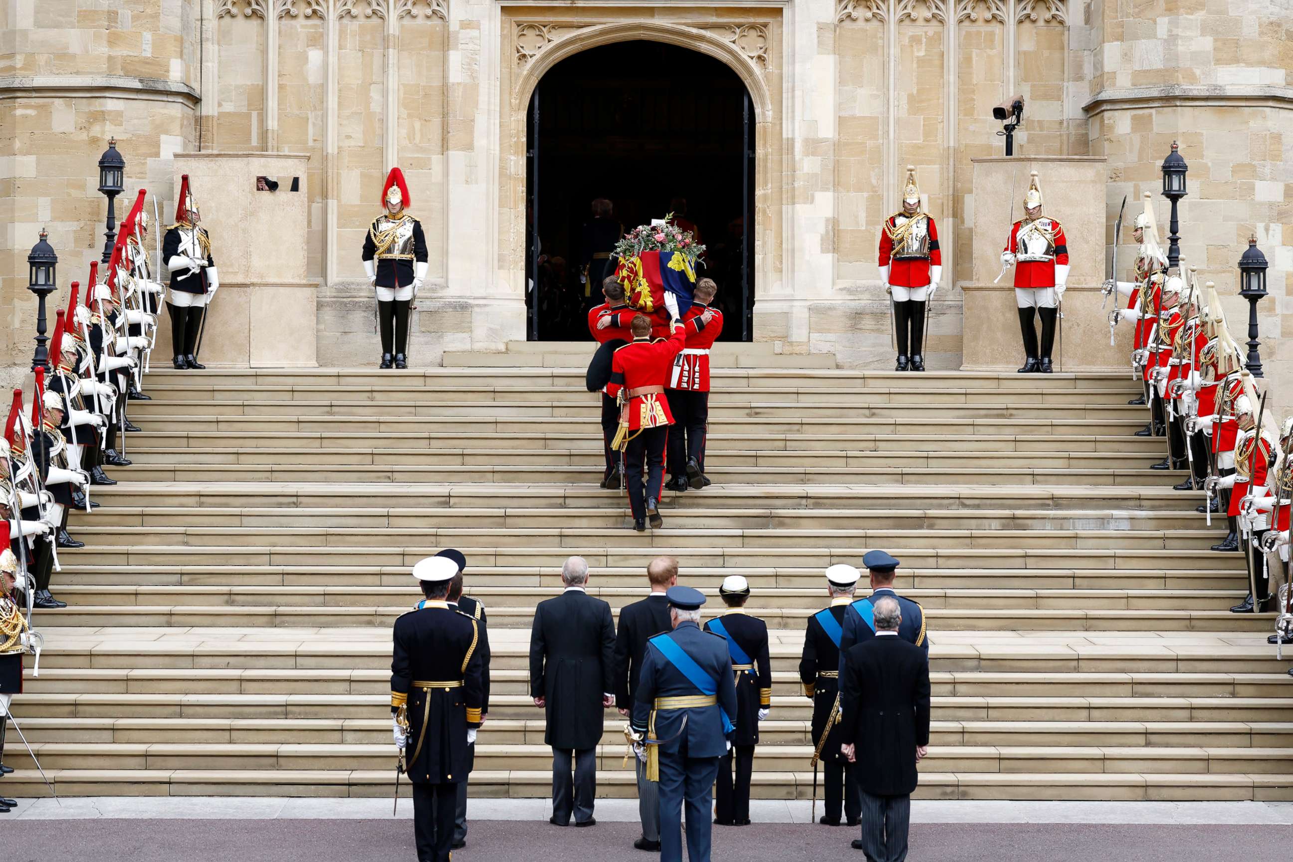 PHOTO: Pall bearers carry the coffin of Queen Elizabeth II with the Imperial State Crown resting on top into St. George's Chapel, Sept. 19, 2022, in Windsor, England. 