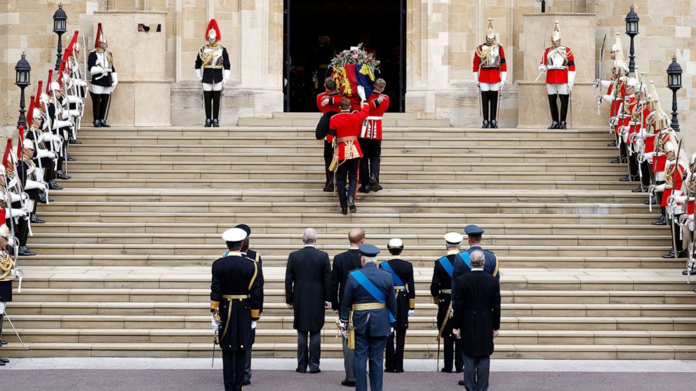 PHOTO: Pall bearers carry the coffin of Queen Elizabeth II with the Imperial State Crown resting on top into St. George's Chapel, Sept. 19, 2022, in Windsor, England. 