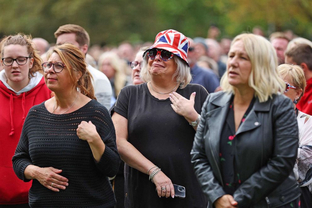 PHOTO: Members of the public look on on Sept. 19, 2022 in Windsor, England. The committal service at St George's Chapel, Windsor Castle, followed the state funeral at Westminster Abbey. A private burial in The King George VI Memorial Chapel followed.