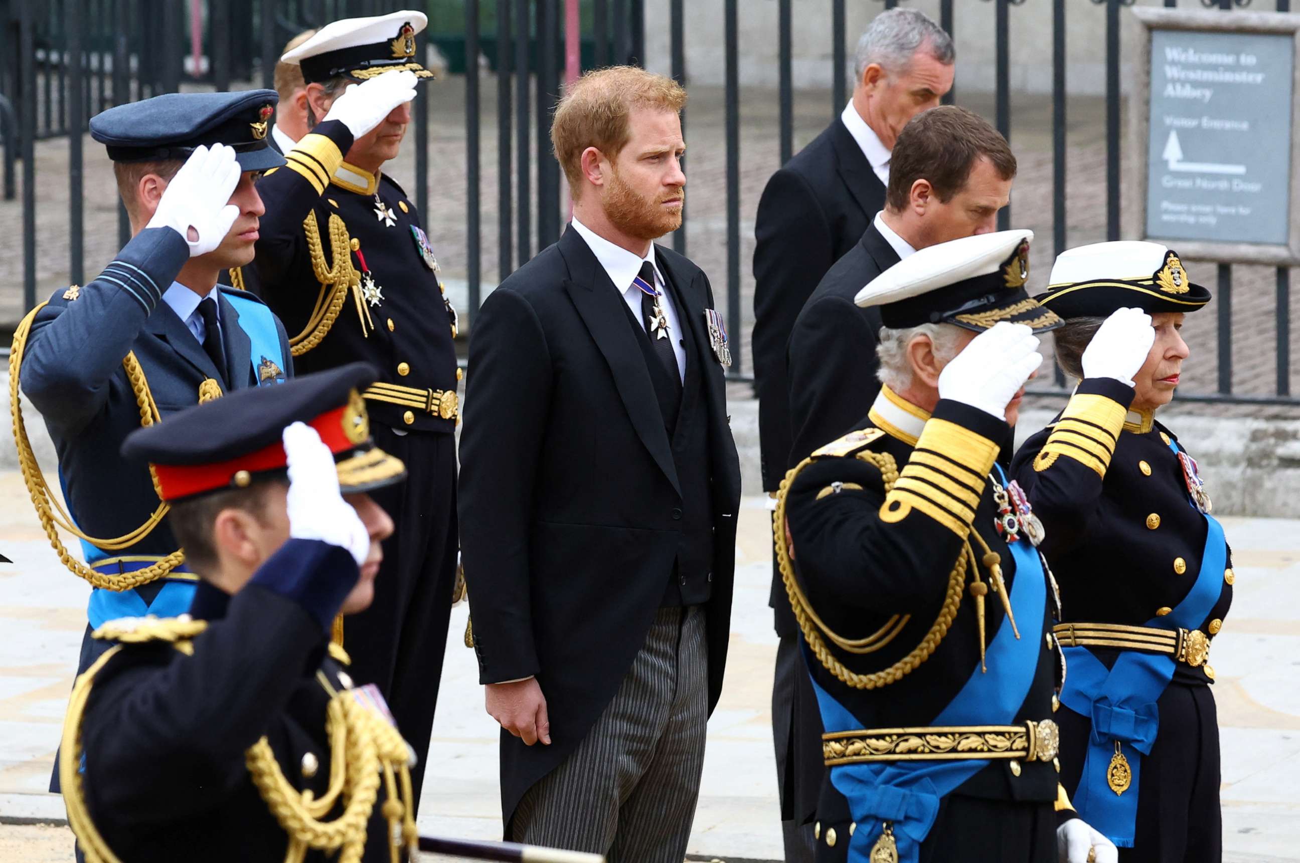 PHOTO: Prince Harry, Duke of Sussex, stands next to King Charles, Anne, Princess Royal, and William, Prince of Wales, as they salute during the state funeral and burial of Britain's Queen Elizabeth, in London, Sept. 19, 2022.