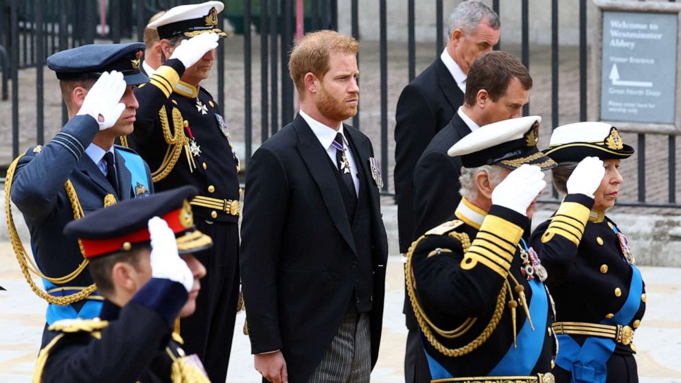 PHOTO: Prince Harry, Duke of Sussex, stands next to King Charles, Anne, Princess Royal, and William, Prince of Wales, as they salute during the state funeral and burial of Britain's Queen Elizabeth, in London, Sept. 19, 2022.