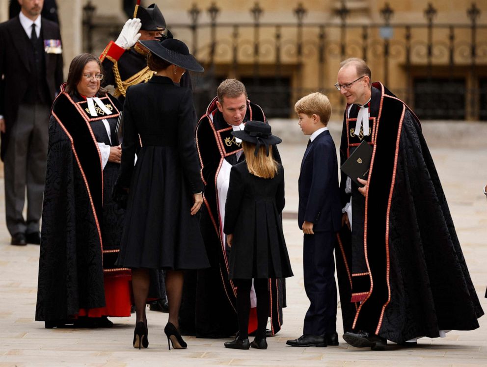 PHOTO: Catherine, Princess Charlotte and Prince George are greeted by The Reverend Jamie Hawkey, The Right Reverend Anthony Ball and The Venerable Patricia Hillas outside Westminster Abbey in London, Sept. 19, 2022.