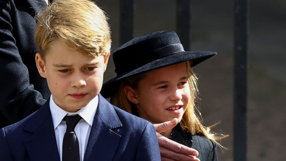 PHOTO: Prince George and Princess Charlotte walk after a service at Westminster Abbey on the day of the state funeral and burial of Britain's Queen Elizabeth II, in London, Sept. 19, 2022.