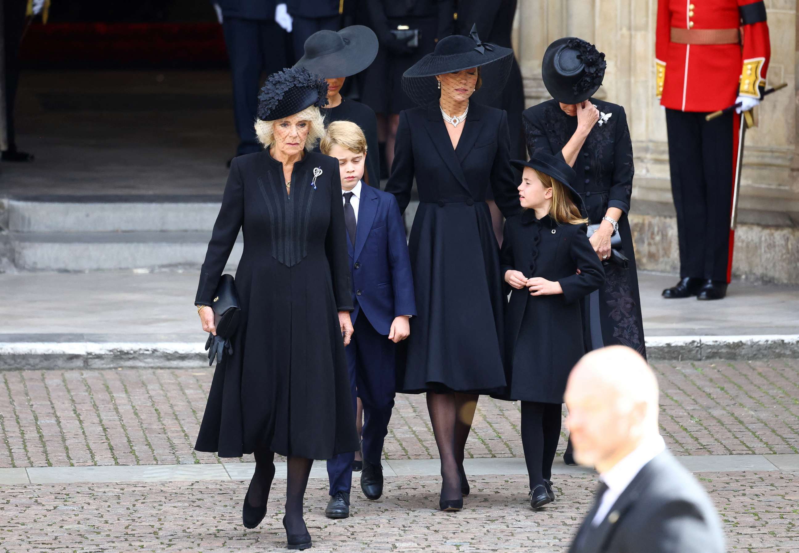 PHOTO: Camilla, Prince George, Princess Charlotte, Catherine, Princess of Wales, Meghan and Sophie, walk after a service at Westminster Abbey on the day of the state funeral and burial of Britain's Queen Elizabeth, in London, Sept. 19, 2022.