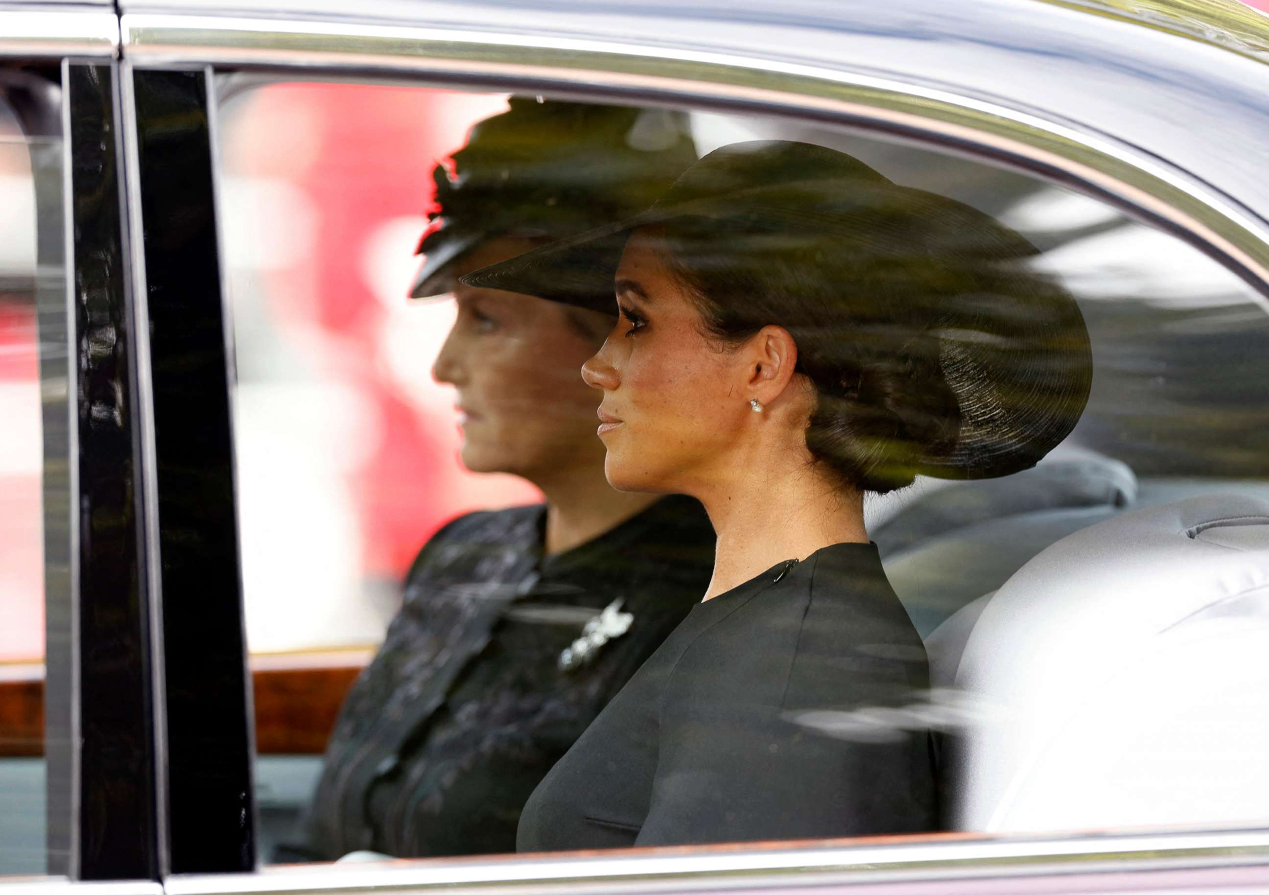 PHOTO: Meghan, Duchess of Sussex is seen in a car during the procession following the service, on the day of the state funeral and burial of Britain's Queen Elizabeth, in London, Sept. 19, 2022.