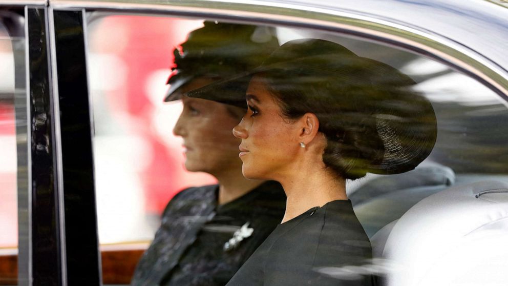 PHOTO: Meghan, Duchess of Sussex is seen in a car during the procession following the service, on the day of the state funeral and burial of Britain's Queen Elizabeth, in London, Sept. 19, 2022.