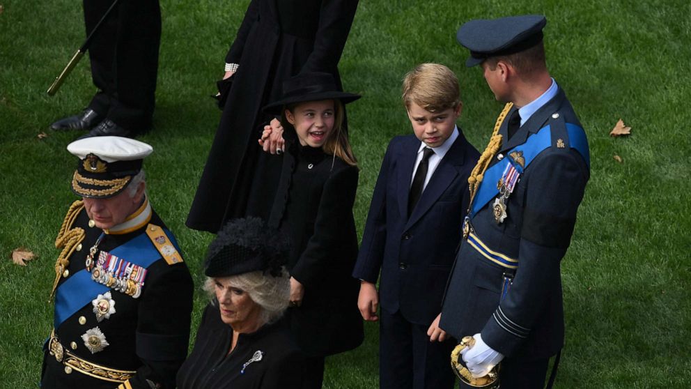 PHOTO: The royal family watches the Bearer Party transferring the coffin of Queen Elizabeth II, draped in the Royal Standard, form the State Gun Carriage of the Royal Navy into the State Hearse at Wellington Arch in London, Sept. 19, 2022.
