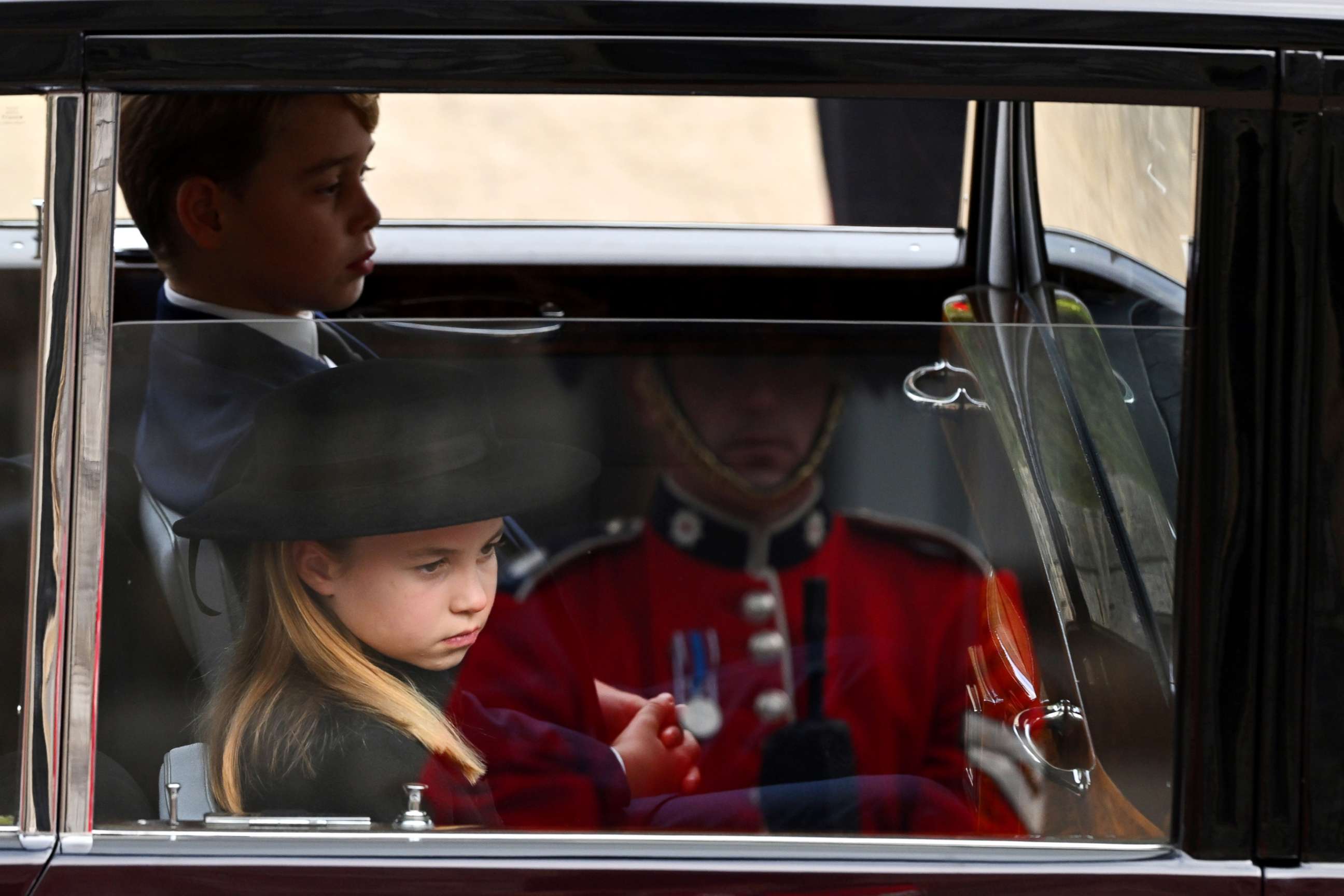 PHOTO: Princess Charlotte of Wales and Prince George of Wales arrive at Windsor Castle for The Committal Service For Her Majesty Queen Elizabeth II on Sept. 19, 2022 in Windsor, England.
