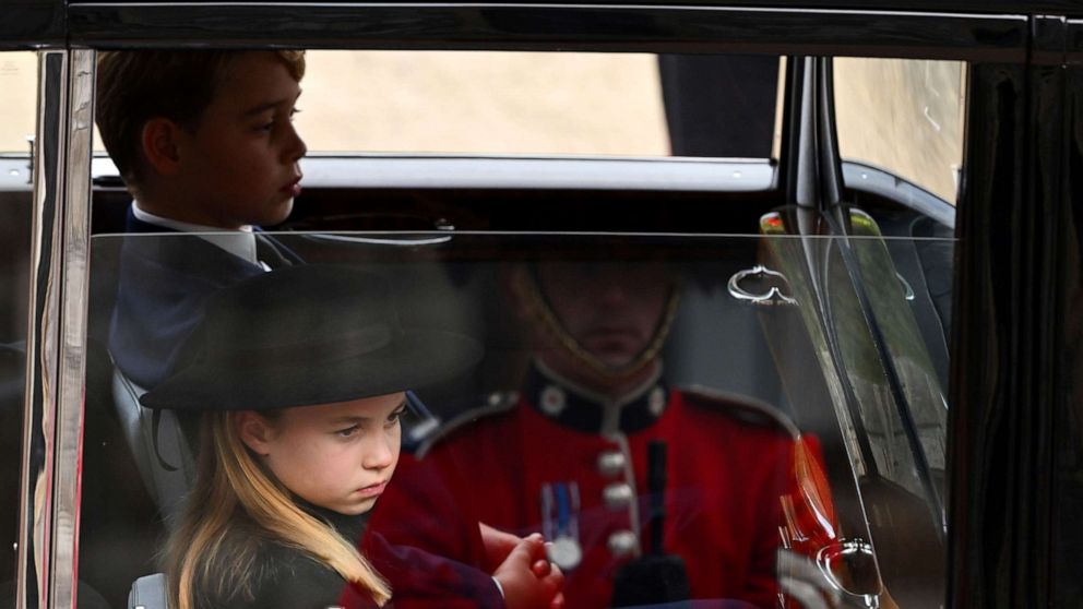 PHOTO: Princess Charlotte of Wales and Prince George of Wales arrive at Windsor Castle for The Committal Service For Her Majesty Queen Elizabeth II on Sept. 19, 2022 in Windsor, England.