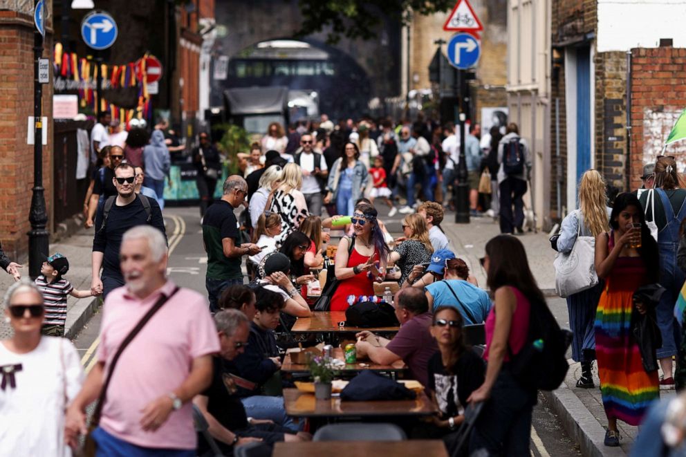 PHOTO: People take part in a community street party in Borough, as the Queen's Platinum Jubilee celebrations continue, in London, Britain, June 3, 2022. REUTERS/Tom Nicholson