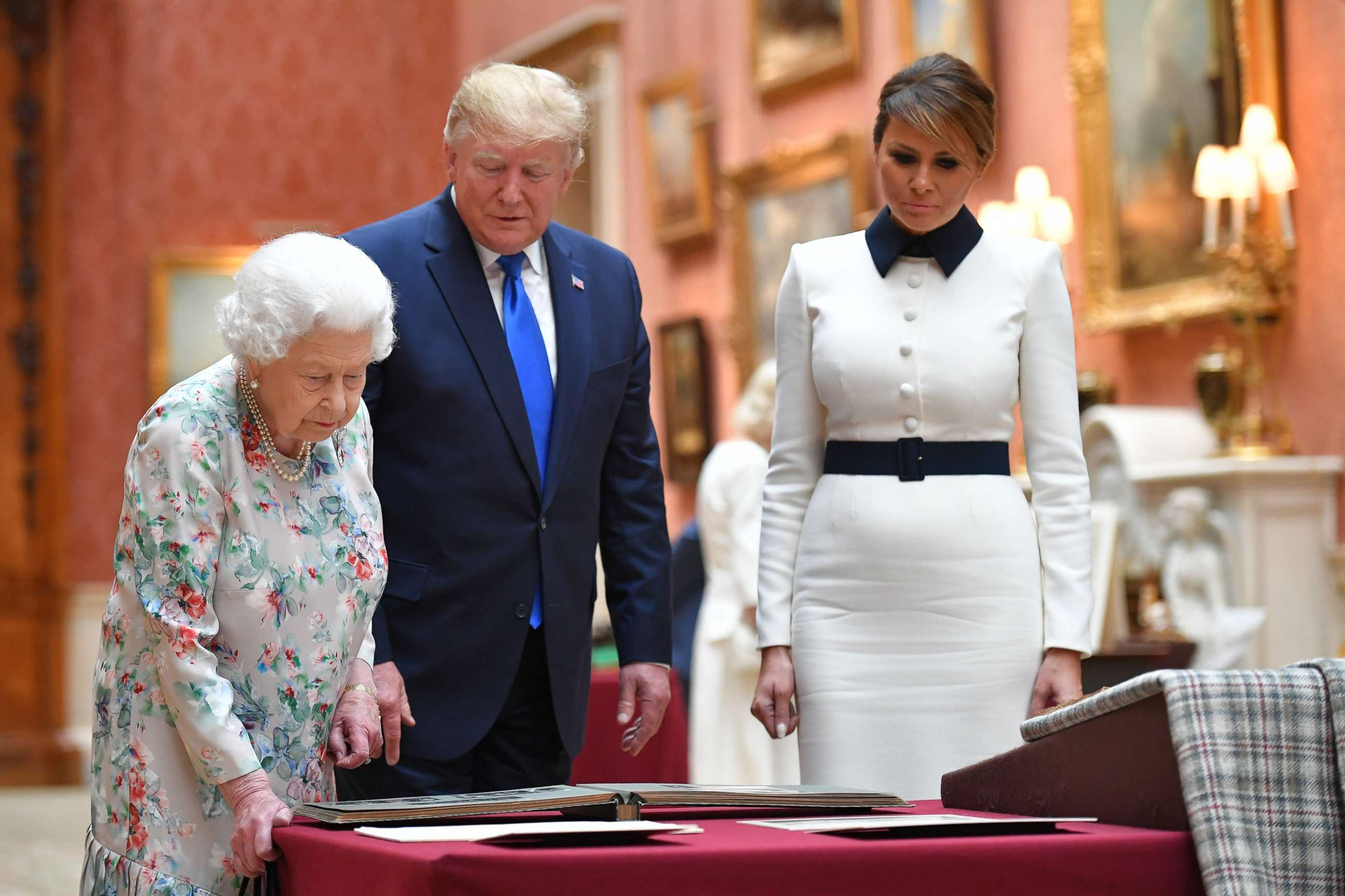 PHOTO: Queen Elizabeth views a display of US items of the Royal collection with President Donald Trump and US First Lady Melania Trump at Buckingham palace in London, June 3, 2019.