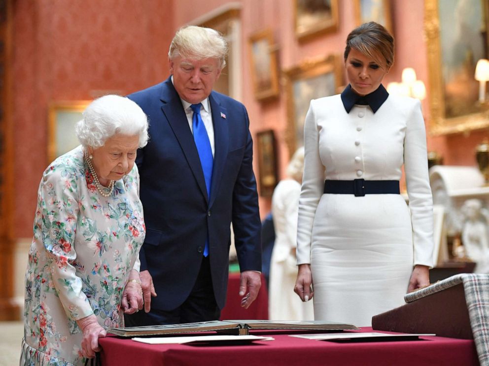 PHOTO: Queen Elizabeth views a display of US items of the Royal collection with President Donald Trump and US First Lady Melania Trump at Buckingham palace in London, June 3, 2019.