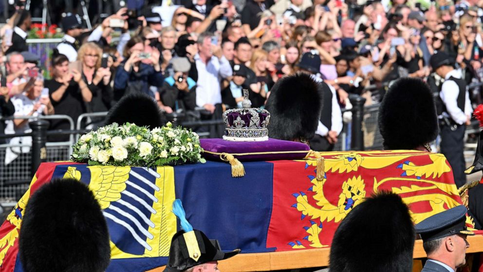 PHOTO: The coffin carrying Queen Elizabeth II makes its way along The Mall during the procession for the Lying-in State of Queen Elizabeth II on Sept. 14, 2022 in London.