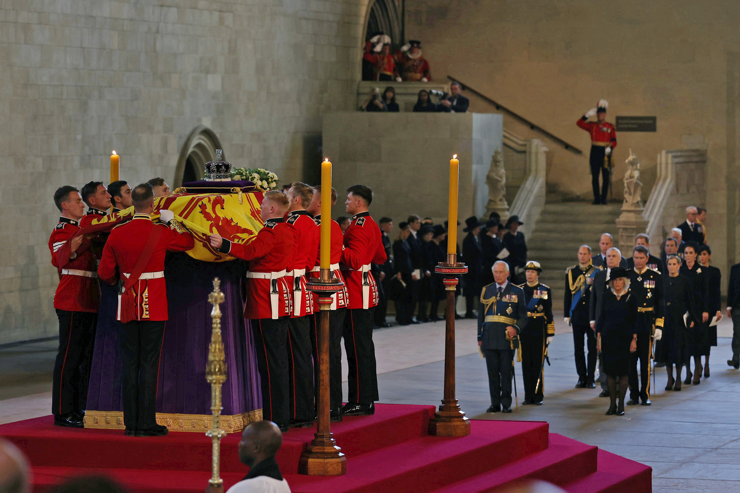 PHOTO: A general view as King Charles III, Princess Anne, Princess Royal and Camilla, Queen Consort view the coffin carrying Queen Elizabeth II being laid to rest in Westminster Hall for the Lying-in State on Sept. 14, 2022 in London.