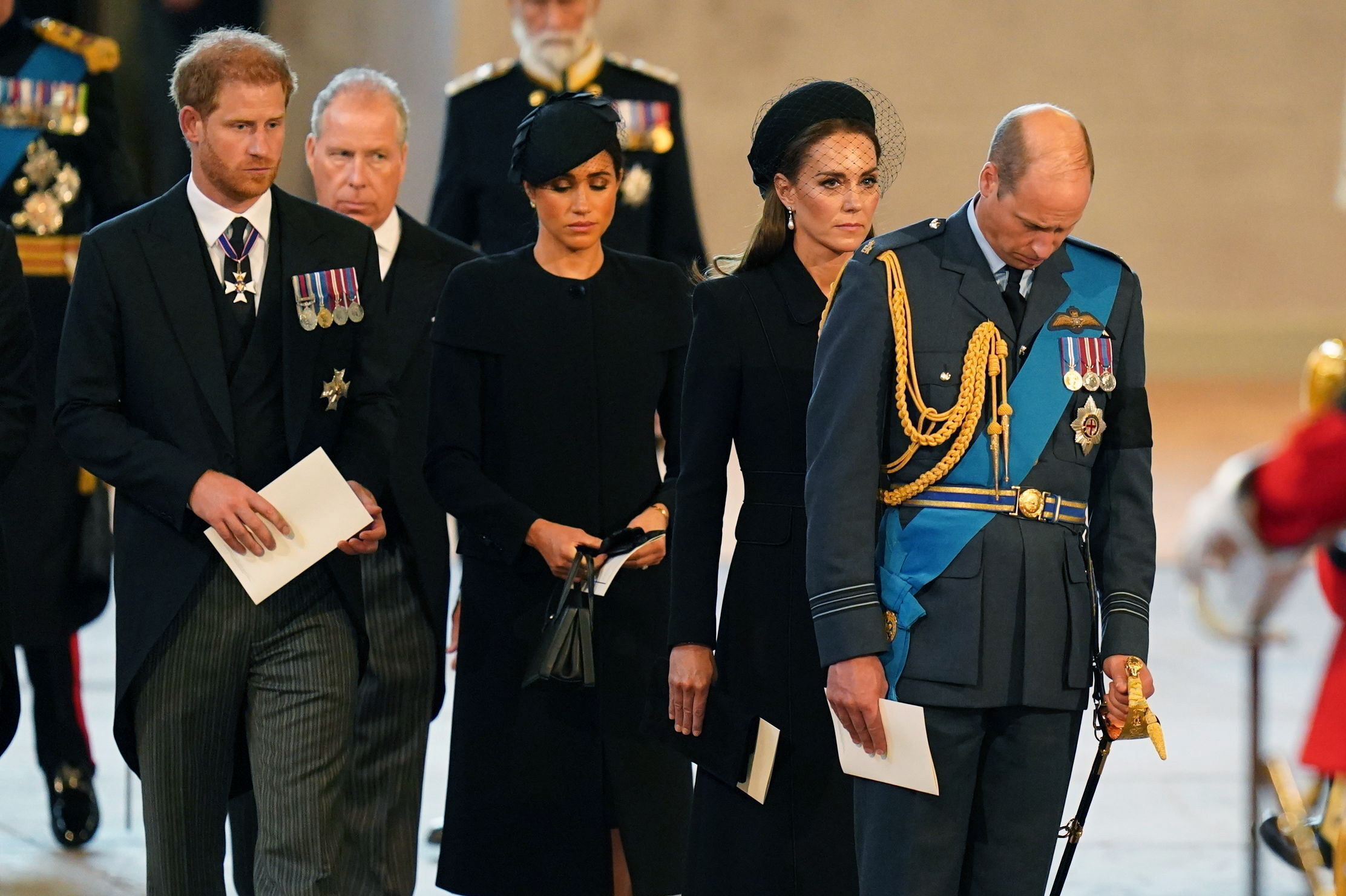 PHOTO: Prince Harry, the Earl of Snowdon, Meghan, the Duchess of Sussex, Kate, Princess of Wales and Prince William follow the bearer party carrying the coffin of Queen Elizabeth II into Westminster Hall, London, Sept. 14, 2022.