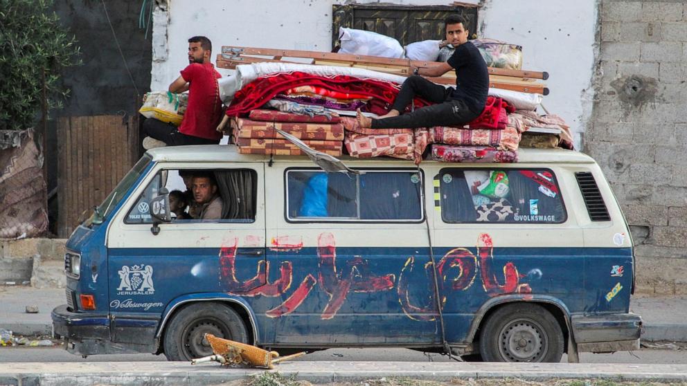 PHOTO: Displaced Palestinians travel in a vehicle as they flee Rafah, on May 12, 2024.