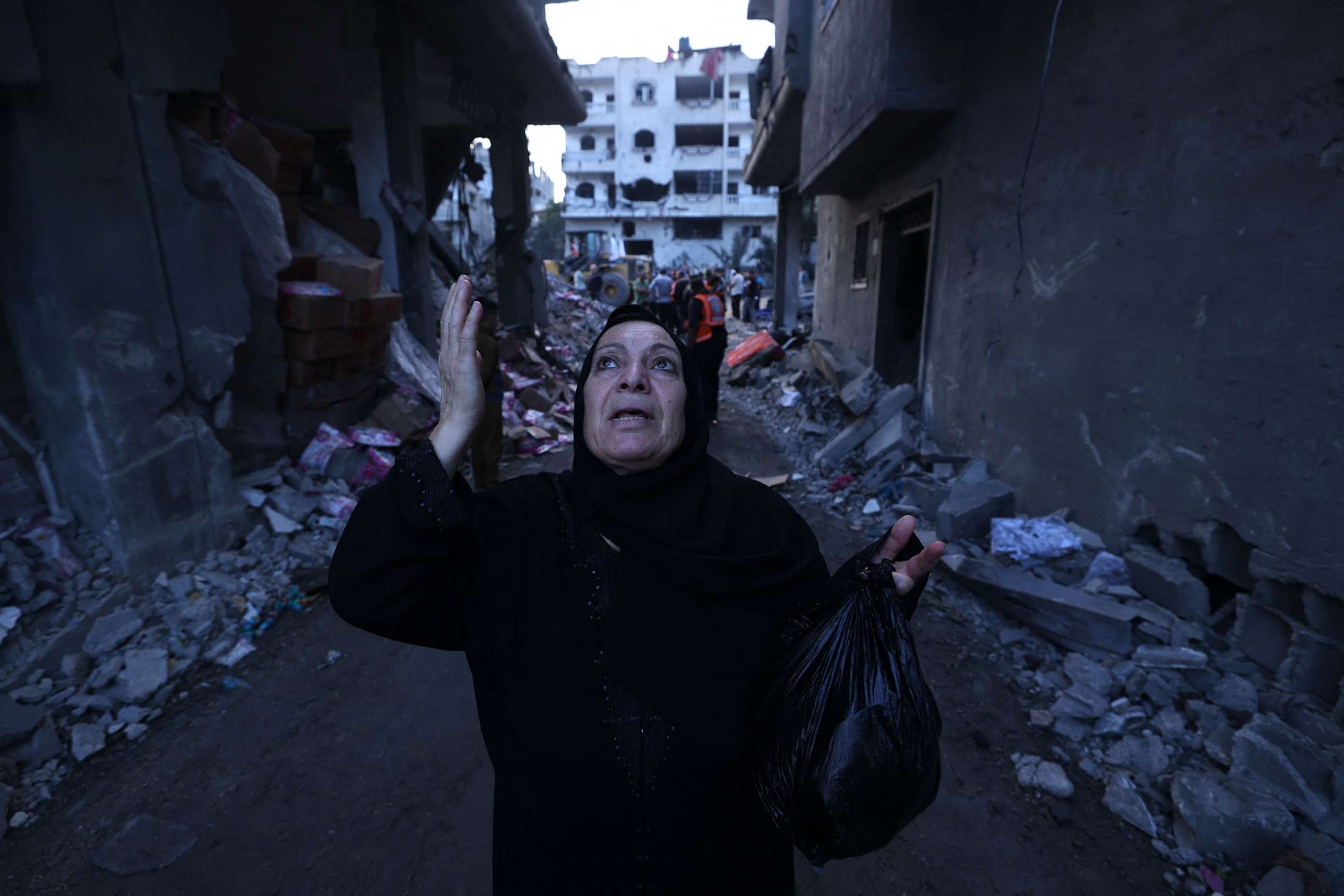 PHOTO: A Palestinian reacts amidst the rubble of a building after an Israeli airstrike on the Rafah refugee camp, in the southern Gaza Strip on Oct. 17, 2023.
