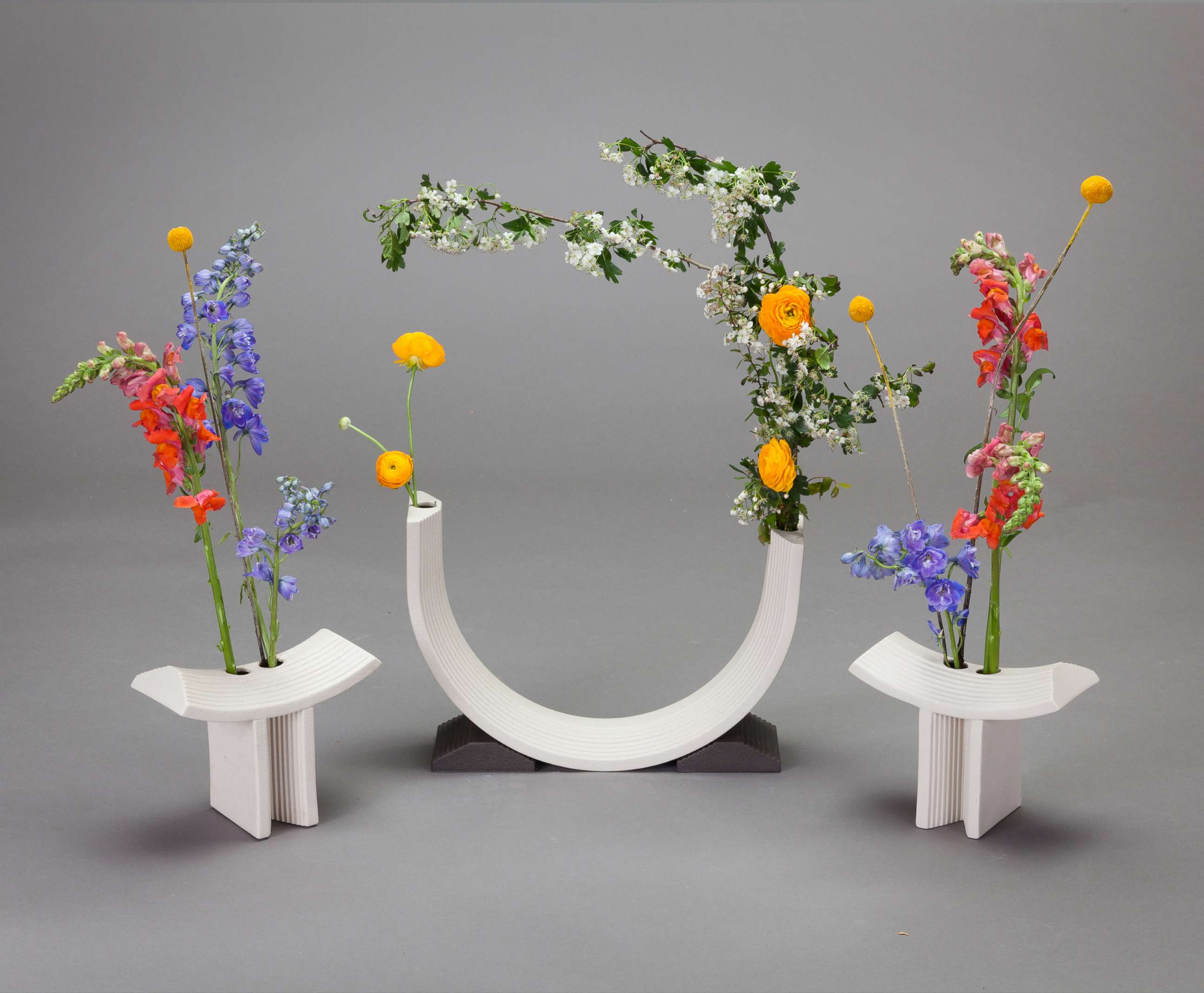 PHOTO: Rainbow flower vases for brand Linea Sette by designer Bethan Laura Wood glass. 