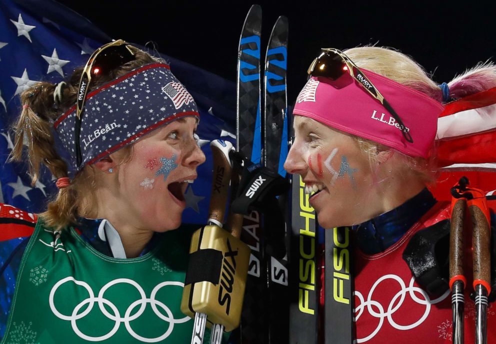 PHOTO: Americans Jessica Diggins, left Kikkan Randall celebrate winning gold in the womens cross country team sprint free final, Feb. 21, 2018.