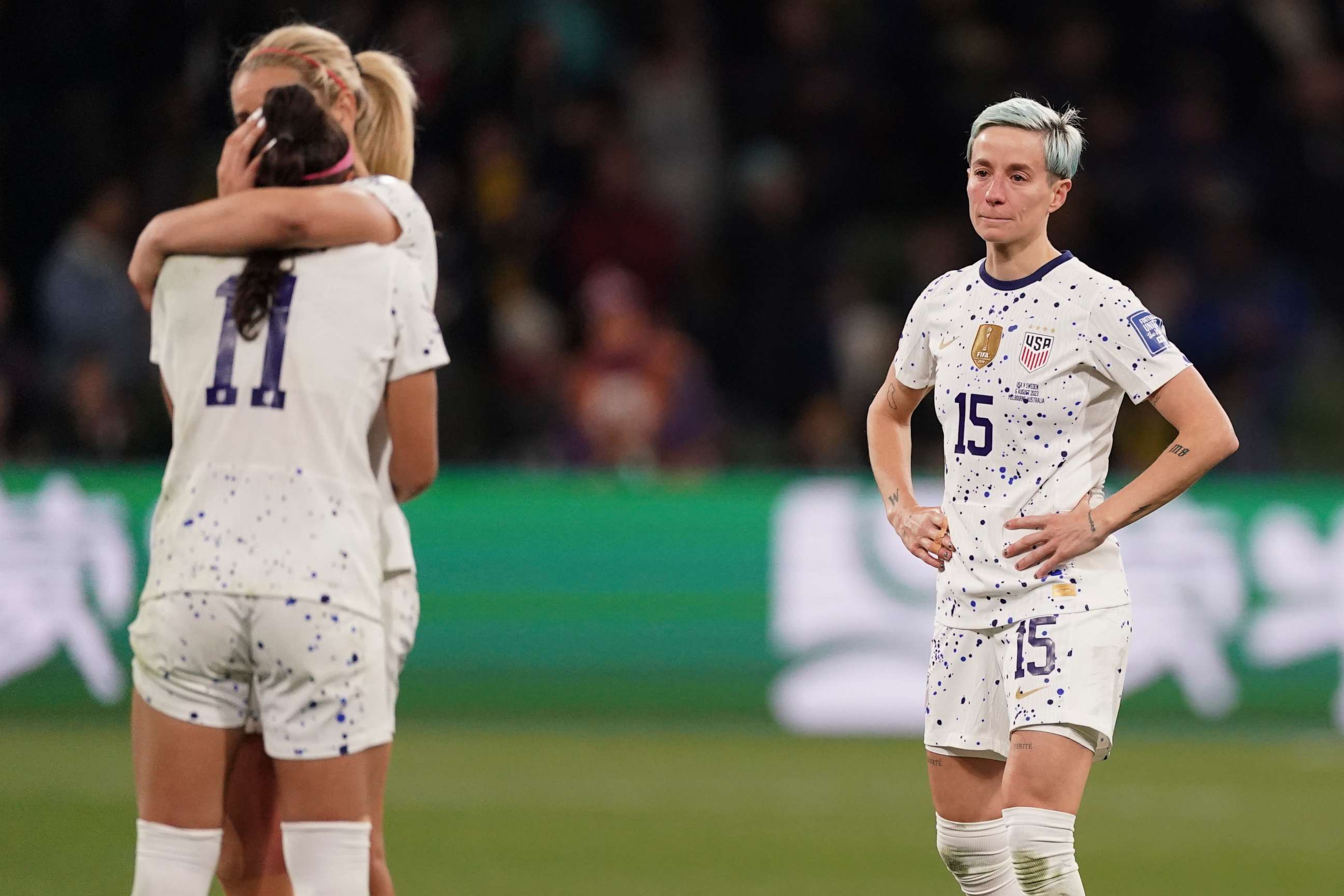 PHOTO: United States' Megan Rapinoe, right, reacts with her teammates following their loss to Sweden in their Women's World Cup round of 16 soccer match in Melbourne, Australia, Sunday, Aug. 6, 2023.