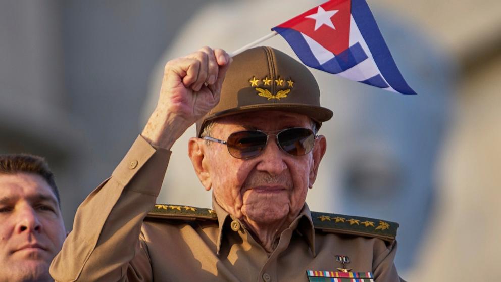 PHOTO: Raul Castro waves a Cuban national flag during a May Day parade at Revolution Square in Havana on May 1, 2025.