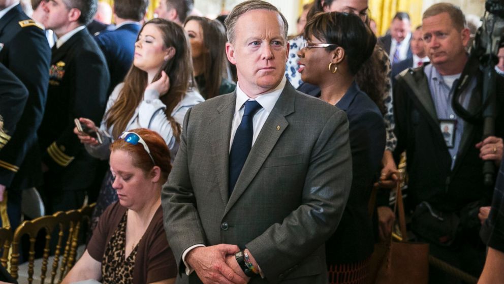 PHOTO: Sean Spicer, White House press secretary, stands at a gathering where President Trump spoke to participants in an annual Wounded Warrior Project Soldier Ride in the East Room at the White House in Washington, April 6, 2017.