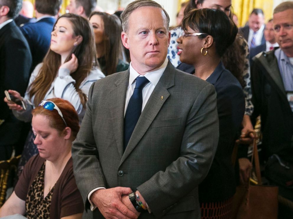 PHOTO: Sean Spicer, White House press secretary, stands at a gathering where President Trump spoke to participants in an annual Wounded Warrior Project Soldier Ride in the East Room at the White House in Washington, April 6, 2017.