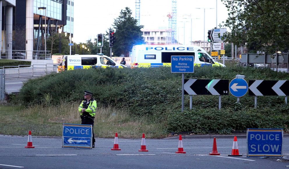 PHOTO: Police investigate near Forbury Gardens in the town centre of Reading, England, where they are responding to a "serious incident" Saturday, June 20, 2020.