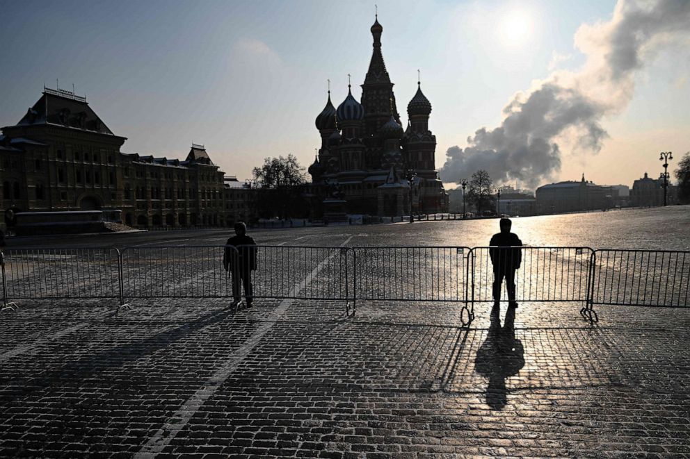 PHOTO: Russian National Guard officers stand guard behind metal barriers set on Red Square prior to Russian President Vladimir Putin's annual state of the nation address, in central Moscow, on Feb. 21, 2023.