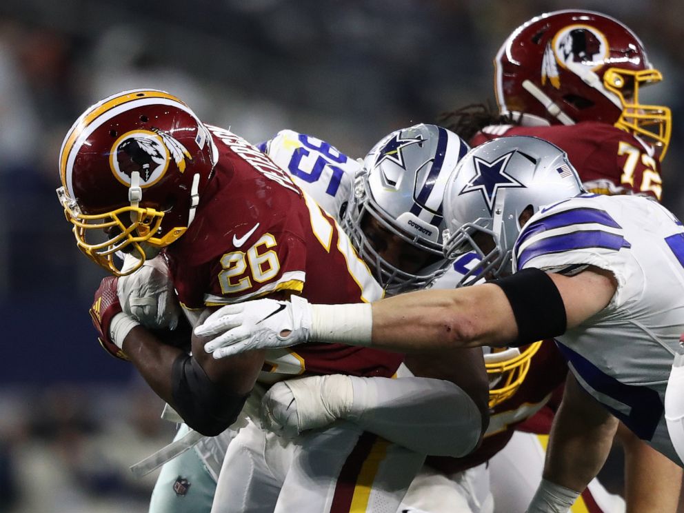 PHOTO: Washington Redskins player runs the ball against the Dallas Cowboys in Arlington, Texas, Dec. 29, 2019.