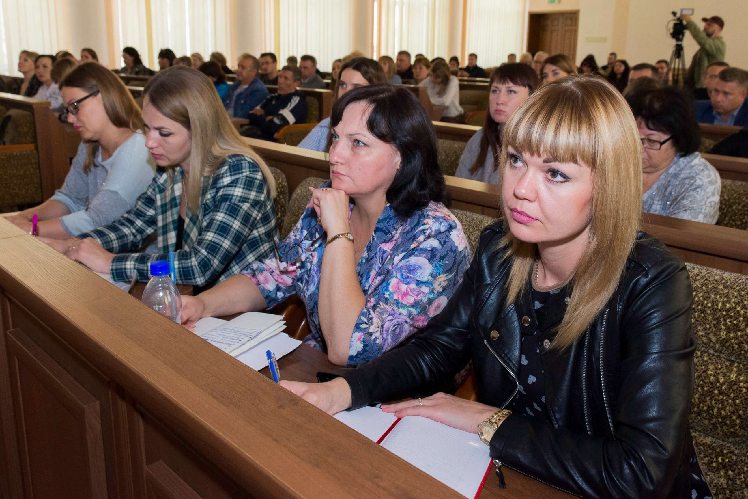PHOTO: Members of the Luhansk regional election commission listen to a speaker as they plan to hold a referendum in Luhansk People's Republic controlled by Russia-backed separatists, in Luhansk, Ukraine, Sept. 21, 2022. 