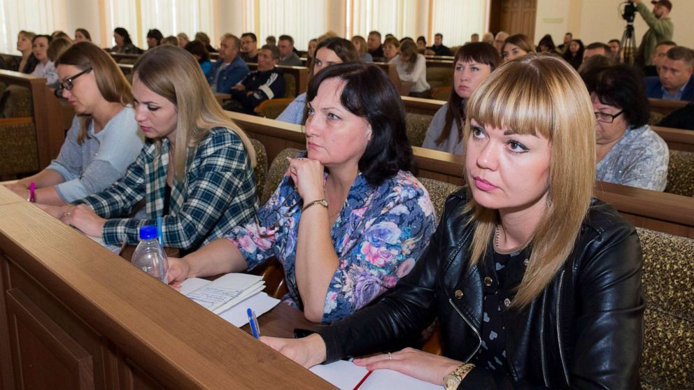 PHOTO: Members of the Luhansk regional election commission listen to a speaker as they plan to hold a referendum in Luhansk People's Republic controlled by Russia-backed separatists, in Luhansk, Ukraine, Sept. 21, 2022. 