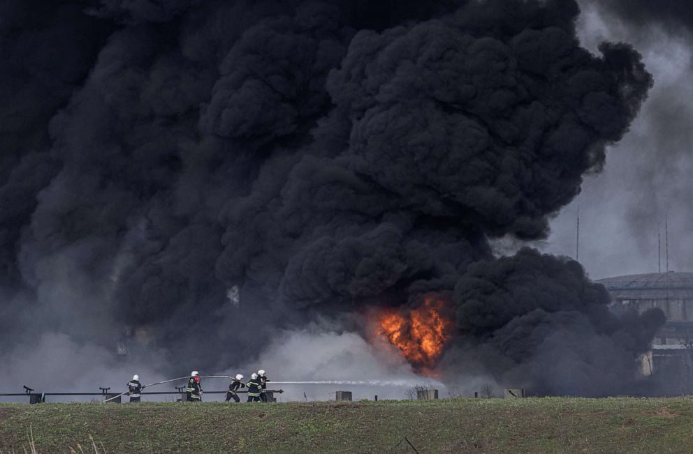 PHOTO: Firefighters work to put out a blaze at the Lysychansk Oil Refinery after if was hit by a missile, April 16, 2022, in Lysychansk, Luhansk region, Ukraine.