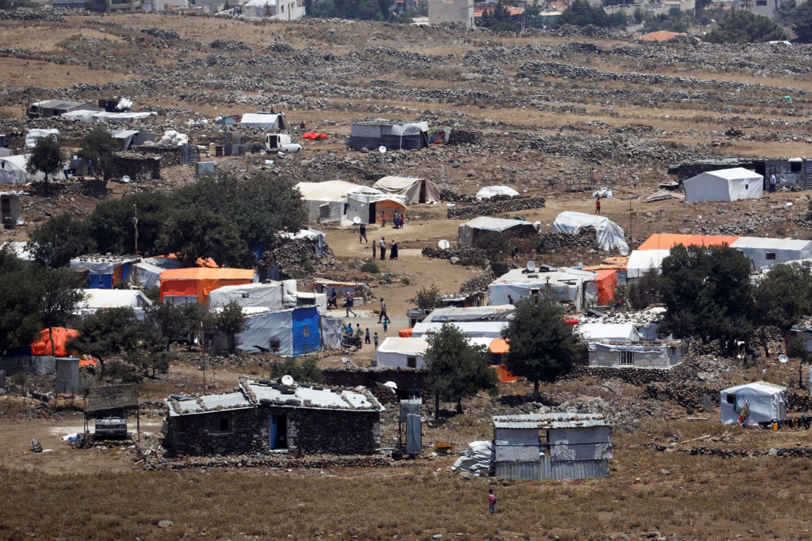 PHOTO: A general view of refugee tents erected on the Syrian side of the Israeli Syrian border, July 17, 2018.