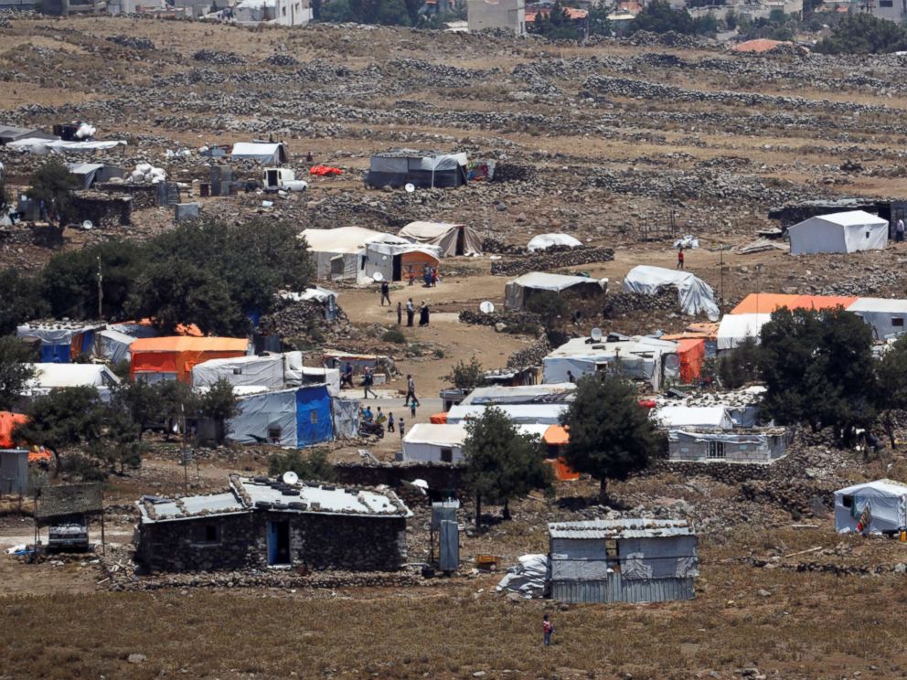 PHOTO: A general view of refugee tents erected on the Syrian side of the Israeli Syrian border, July 17, 2018.