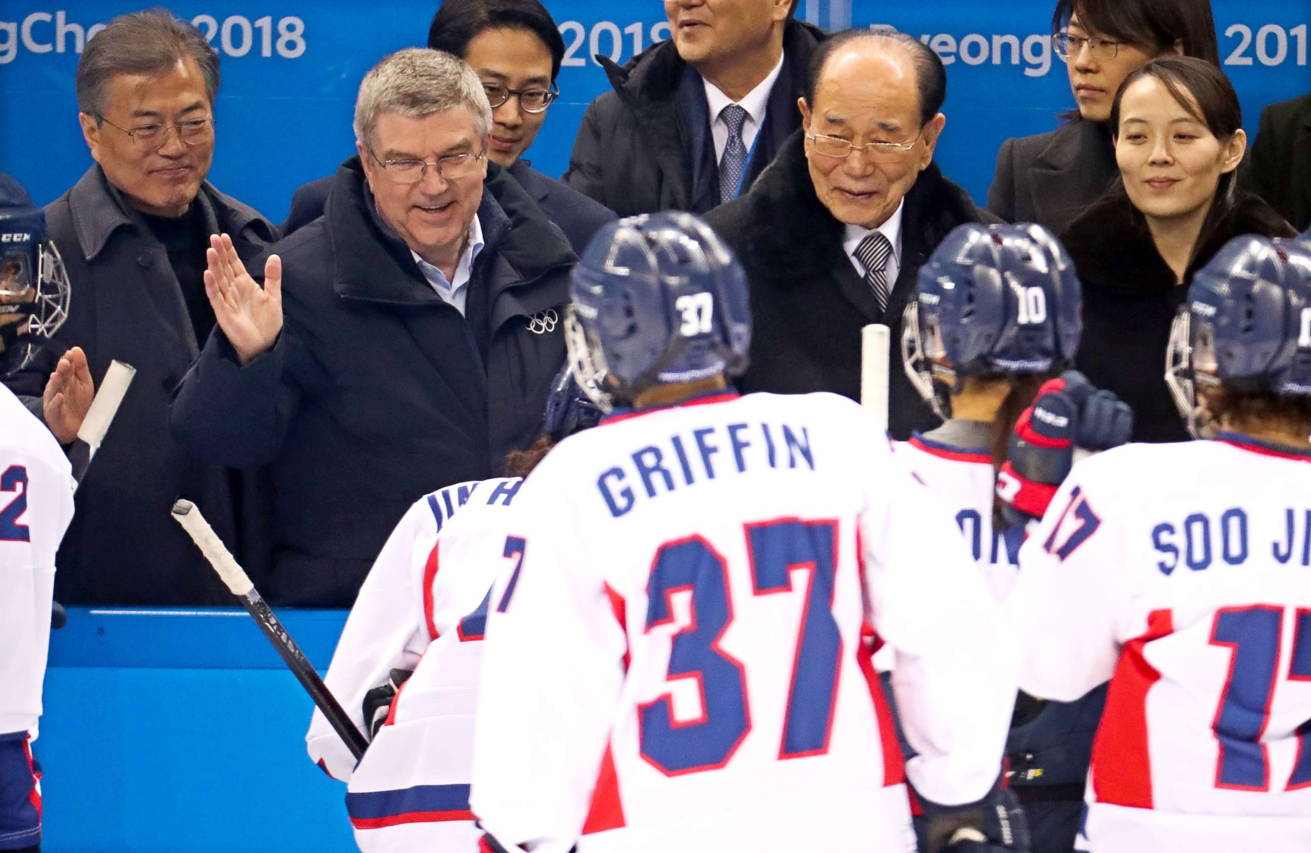 PHOTO: South Korean President Moon Jae-in, IOC President Thomas Bach, North Korea’s ceremonial head of state Kim Young-nam and Kim Yo-jong, the sister to Kim Jong-un, as they greeted the Korean Hockey team after their loss to Switzerland, Feb. 10, 2018.
